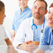 Doctor, nurses and patient